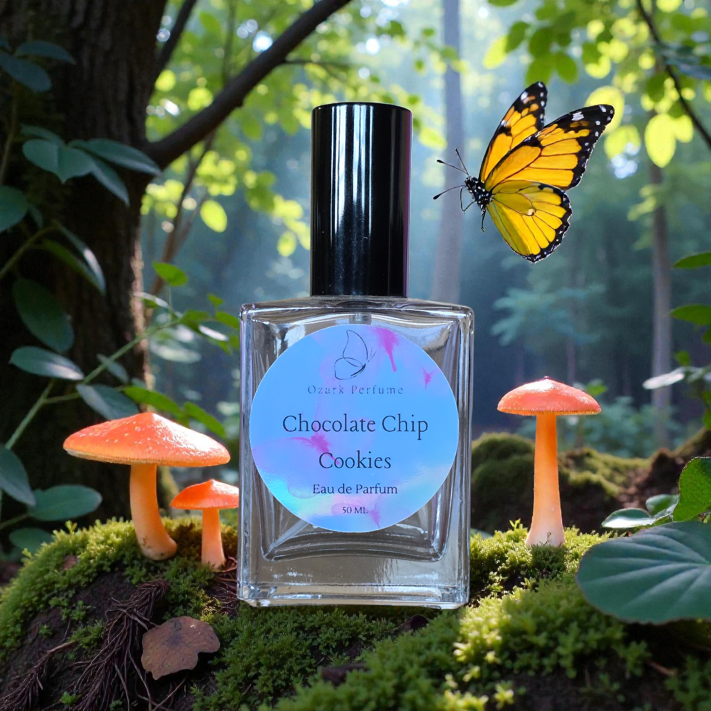 Perfume bottle labeled 'Chocolate Chip Cookies' with a butterfly and mushrooms in a forest setting